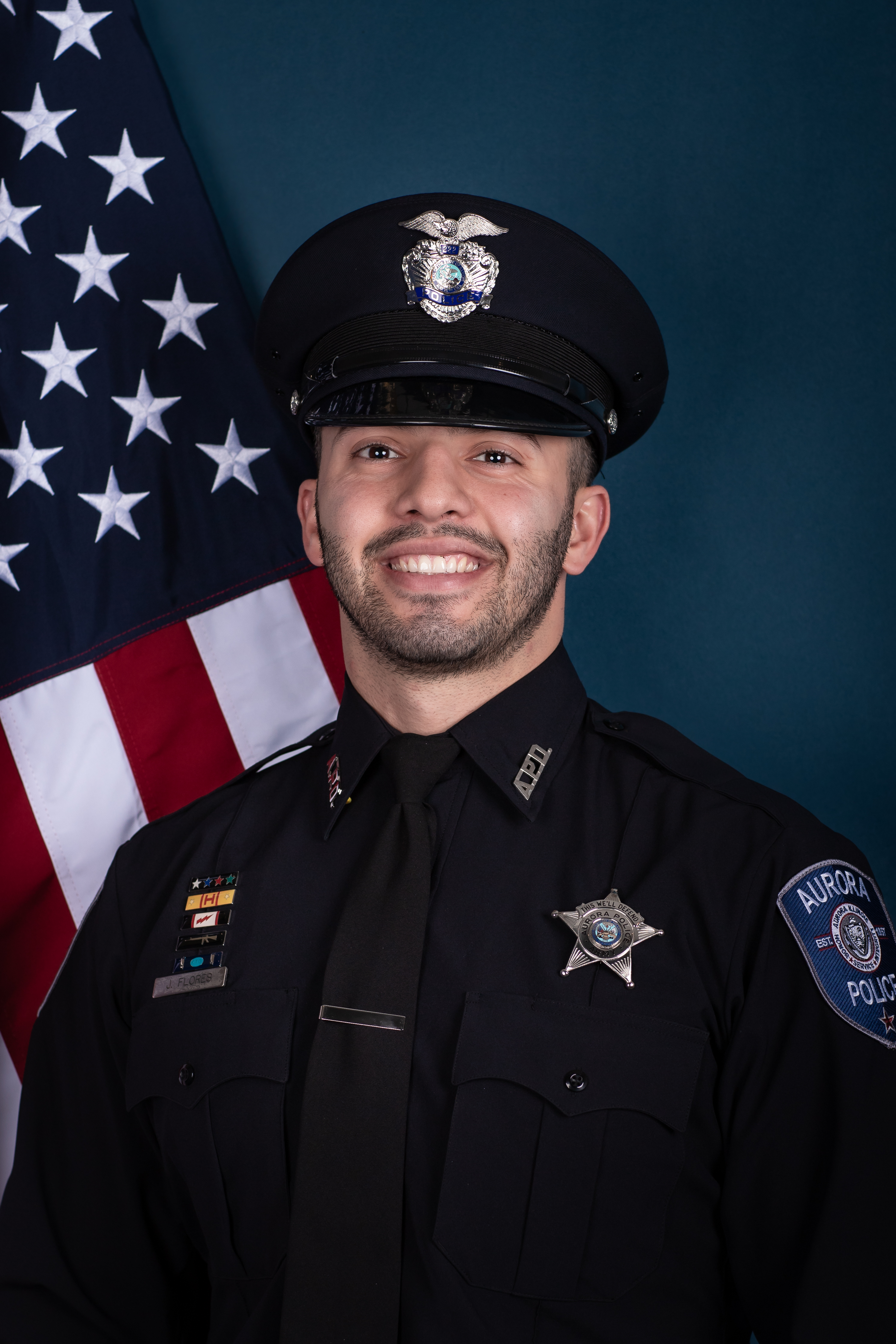 Officer Jonathan Flores smiling